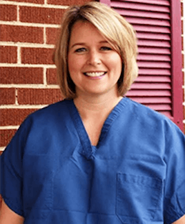 Photo of a woman with a beautiful smile in a uniform